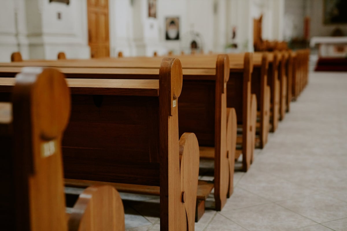 Beautiful church interior with wooden pews